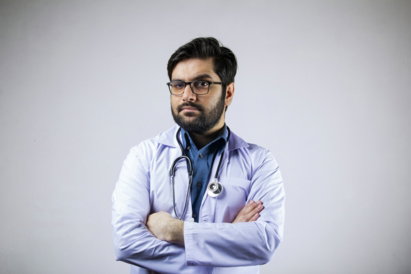man in white dress shirt wearing black framed eyeglasses